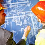 builders-reviewing-plans